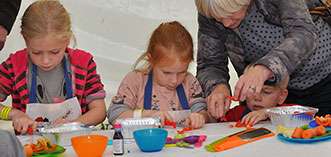 Children learning to cook