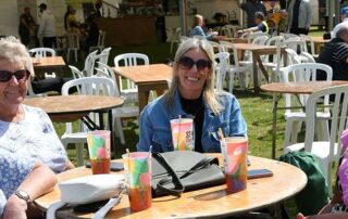 women-enjoying-drink-at-festival Women enjoying a drink together at Stone Food & Drink Festival