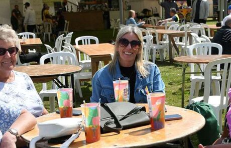 Women enjoying a drink together at Stone Food & Drink Festival